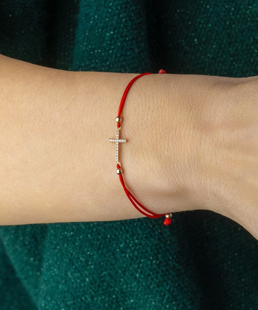Red string bracelet with gold pendant "cross"