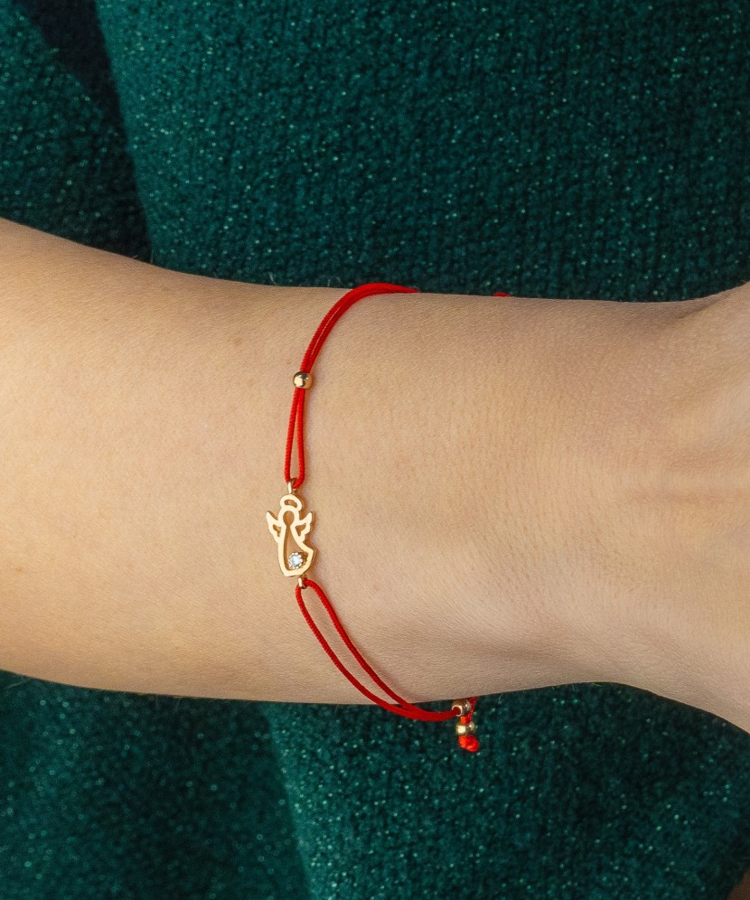 Red string bracelet with gold pendant "angel"