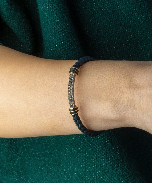 Leather bracelet with gold and zircons