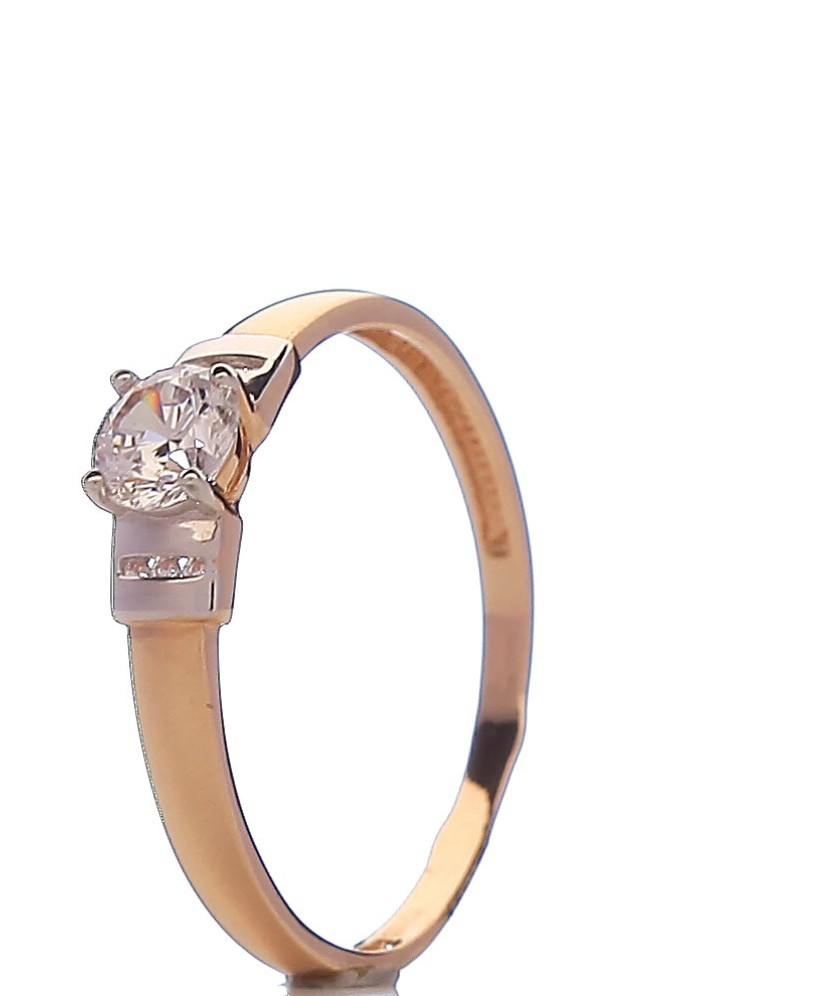 Gold ring with zircons