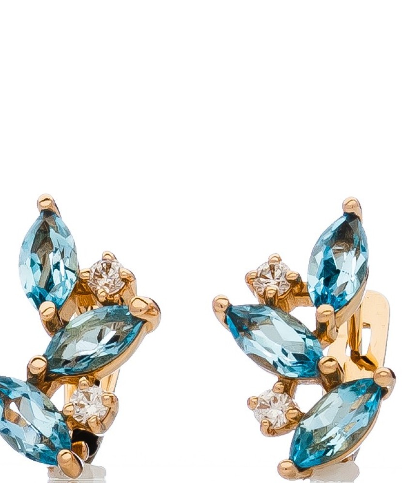 Gold earrings with topazes and zircons