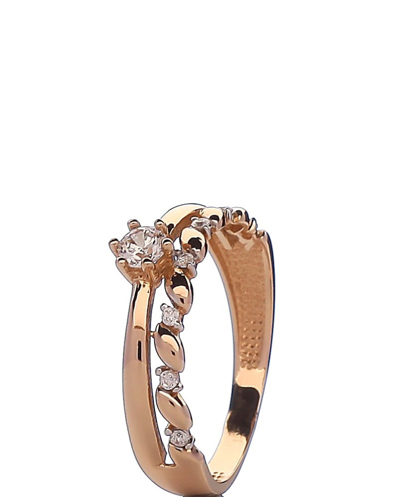 Gold ring with zircons