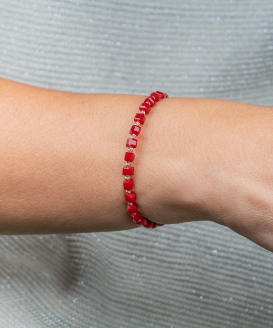 Red string bracelet with gold