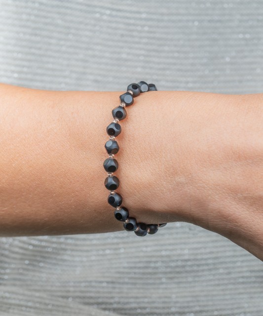 Black string bracelet with gold and onyxes