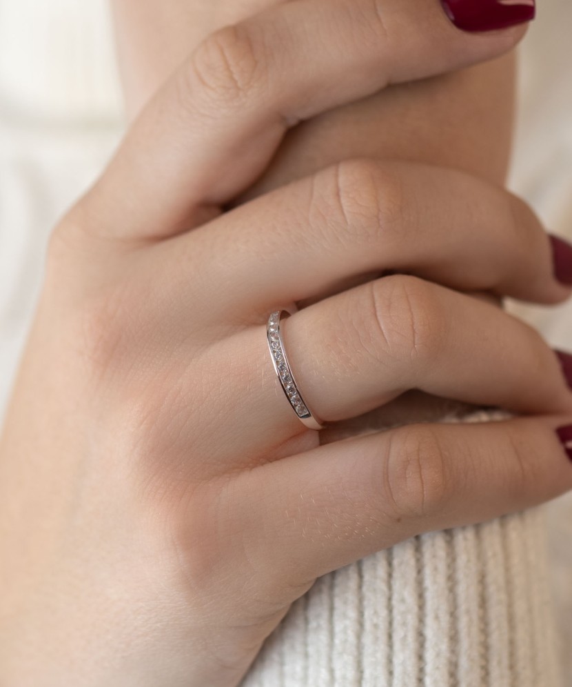 White gold ring with zircons