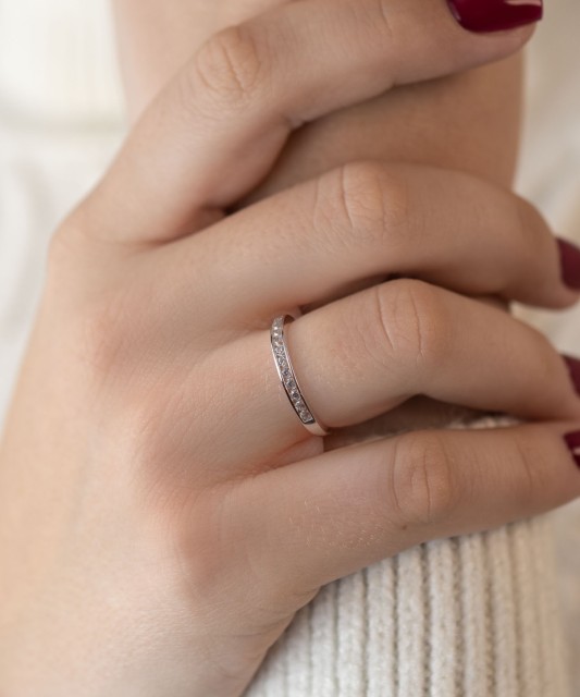 White gold ring with zircons