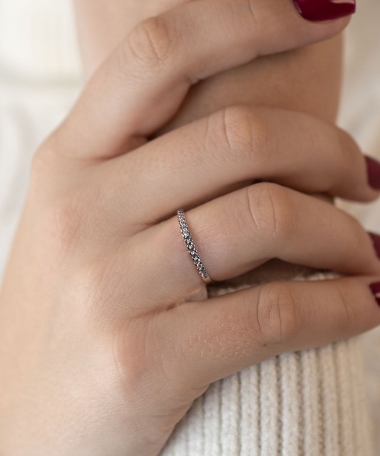 White gold ring with zircons