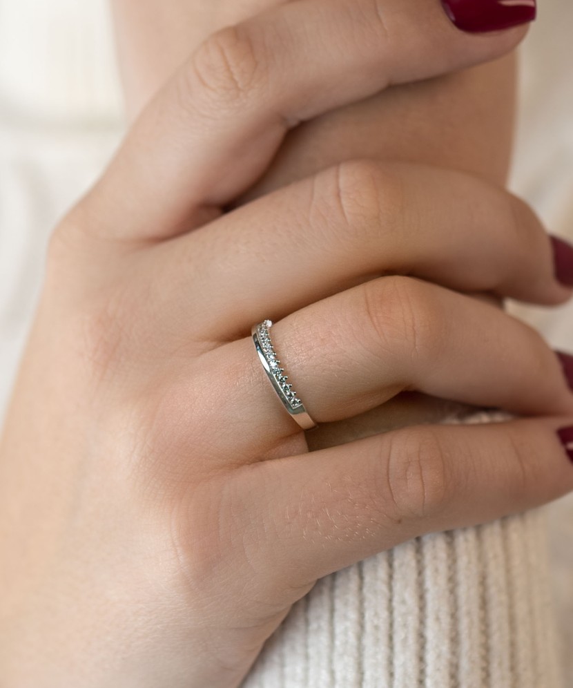 White gold ring with zircons