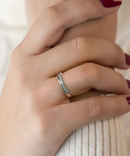 White gold ring with zircons