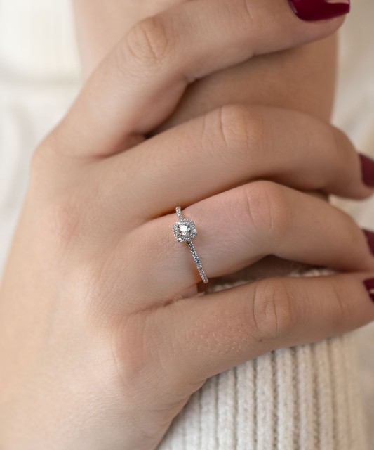 White gold ring with zircons