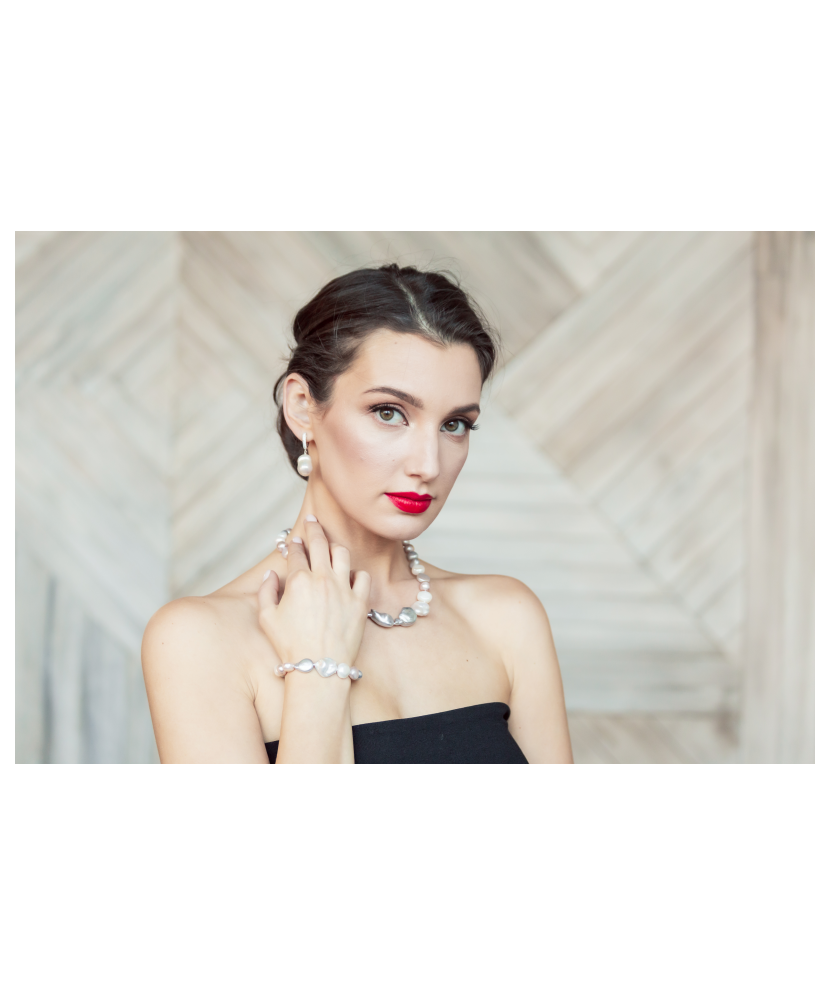 Sterling silver earrings with natural pearl and zircons