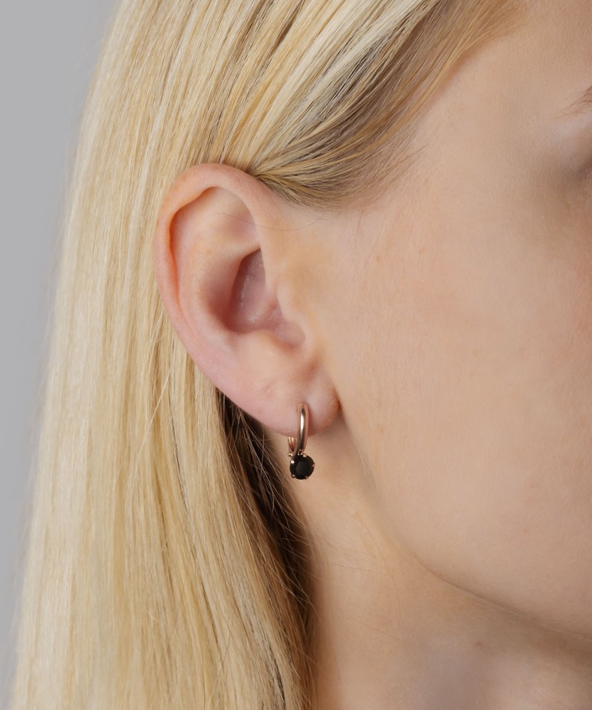 Gold earrings with zircons