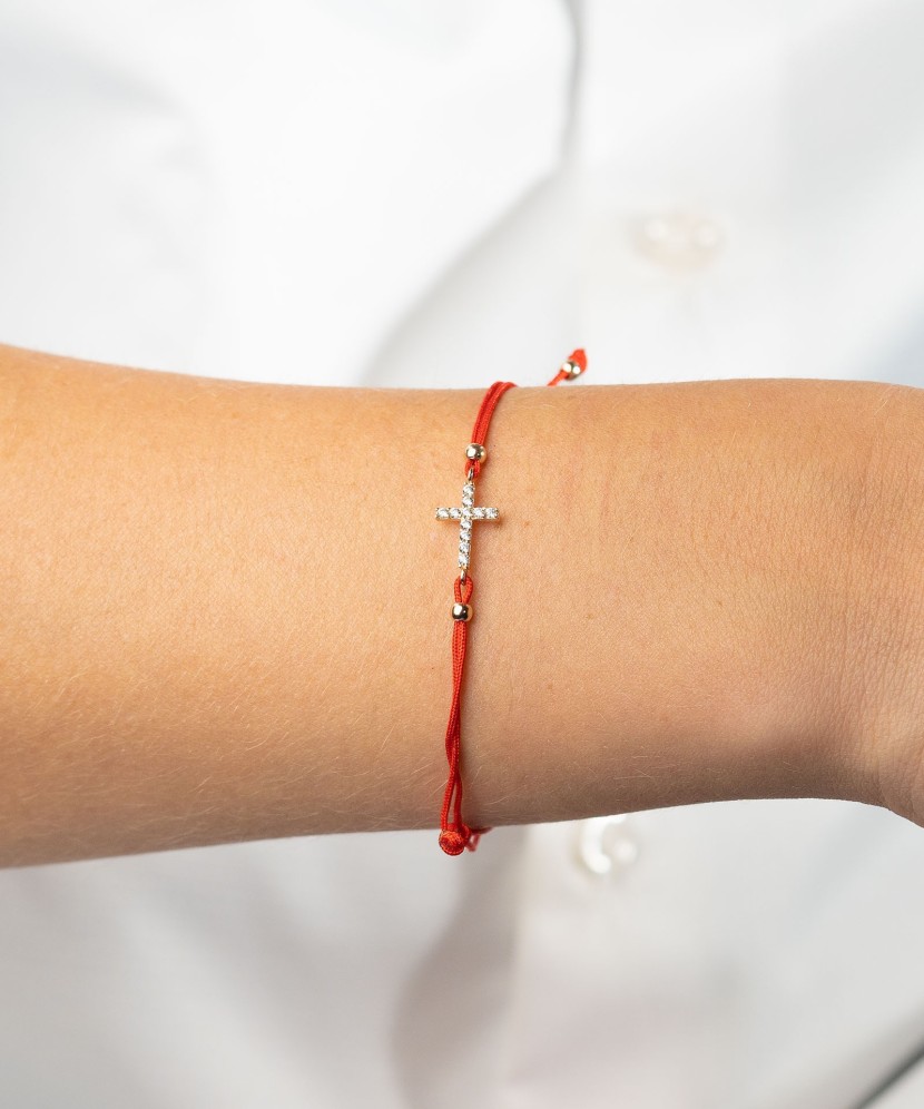 Red string bracelet with gold pendant "cross"