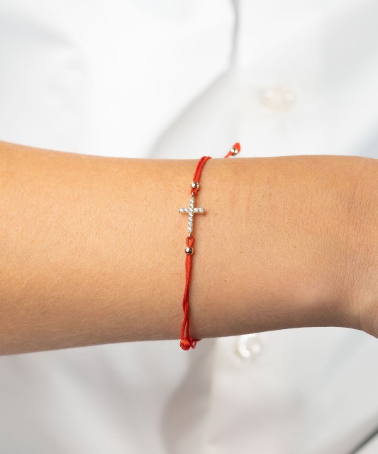 Red string bracelet with gold pendant "cross"