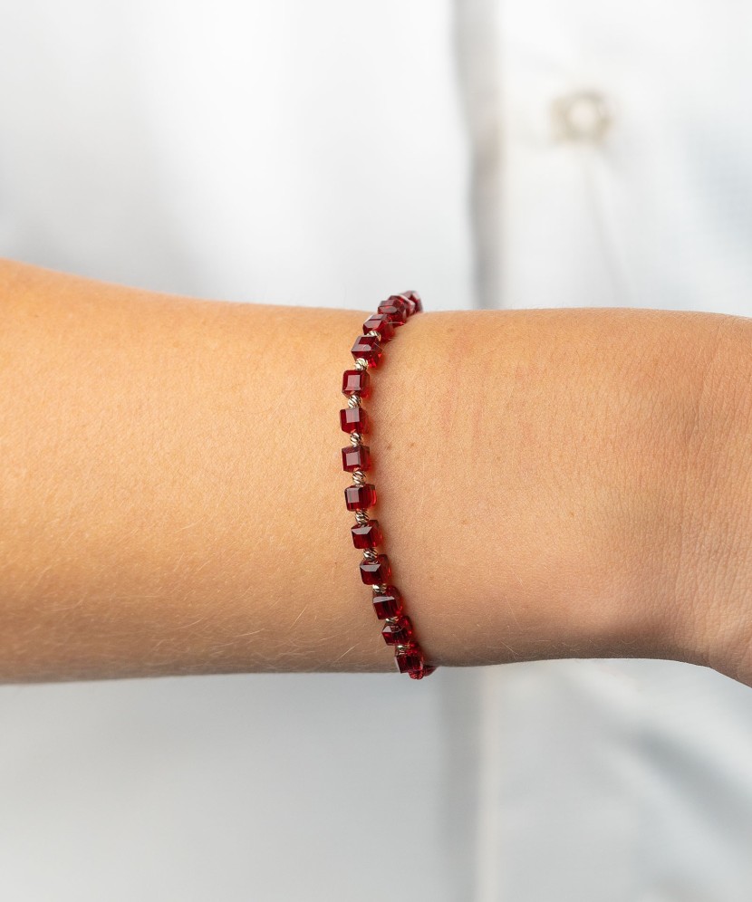 Red string bracelet with gold and onyxes