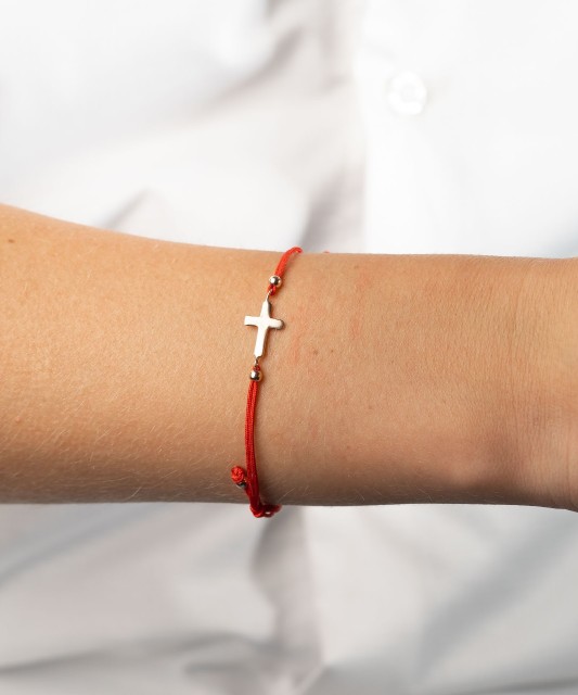 Red string bracelet with gold pendant "cross"