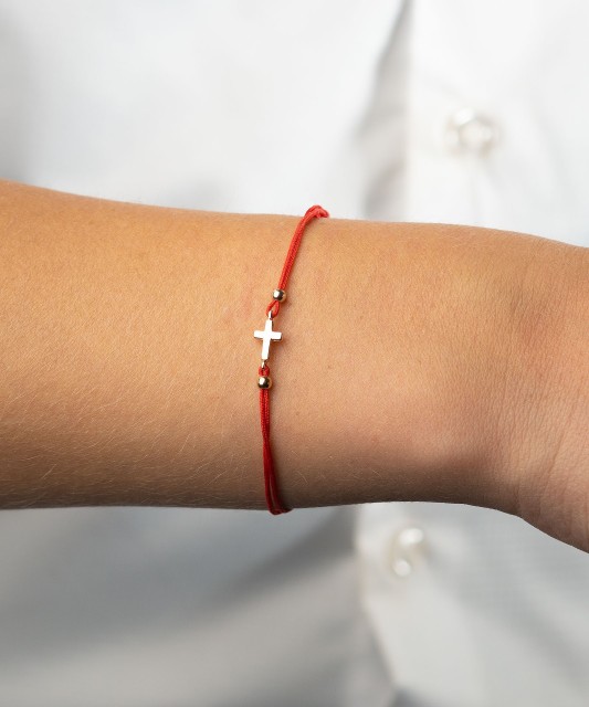 Red string bracelet with gold pendant "cross"