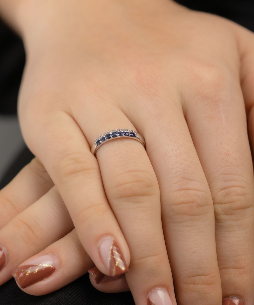 White gold ring with sapphires and diamonds