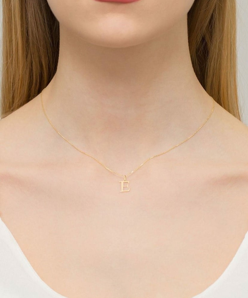 Gold pendant with diamond letter E