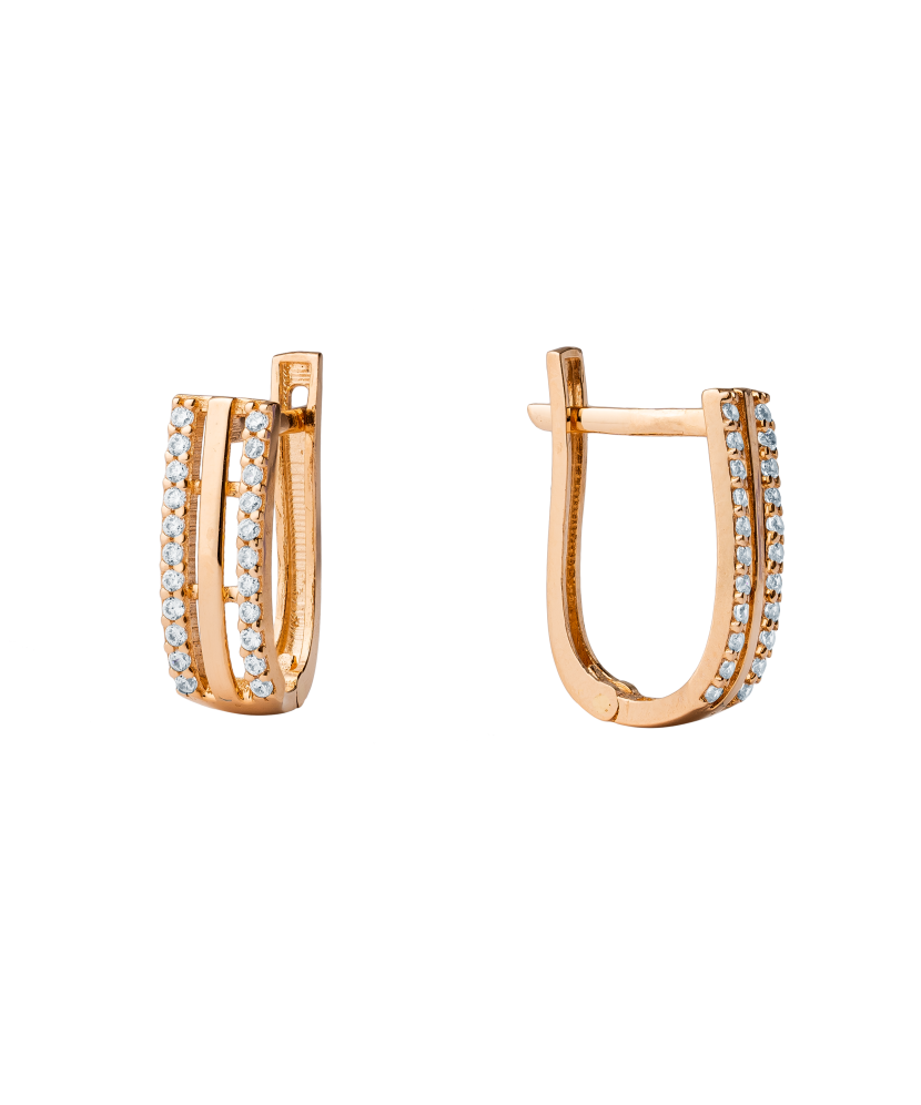 Kultaiset korvakorut zirkoneilla