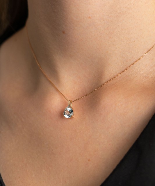 Gold pendant with topaz and diamonds