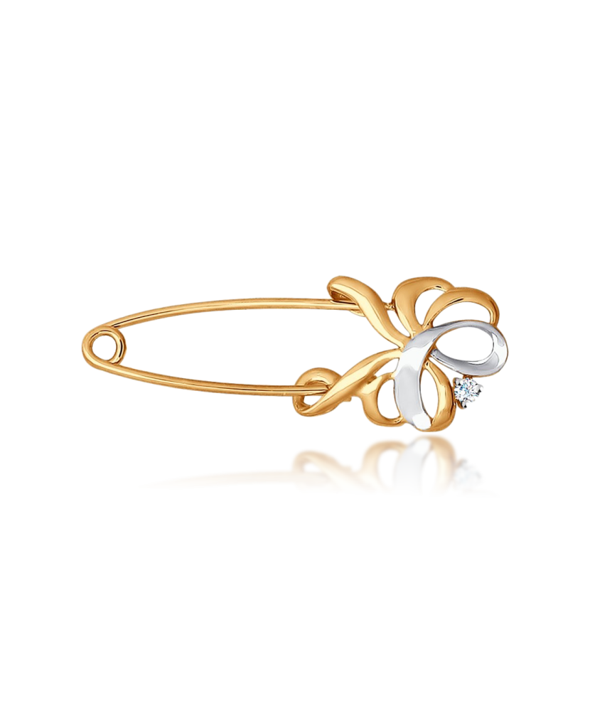 Gold brooch with zirconium