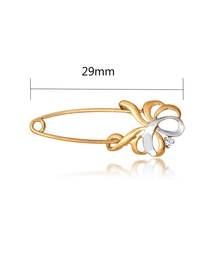 Gold brooch with zirconium
