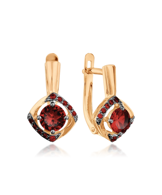 Gold earrings with garnet and zircons