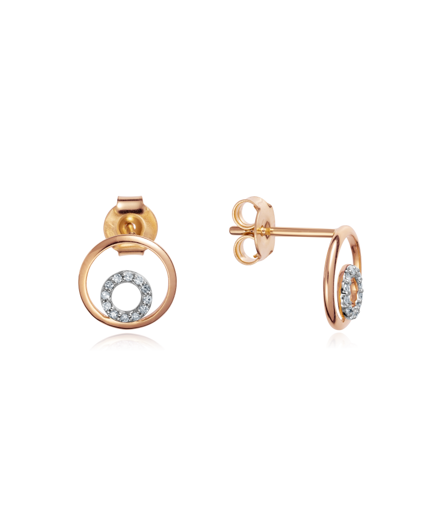 Kultaiset korvakorut timanteilla