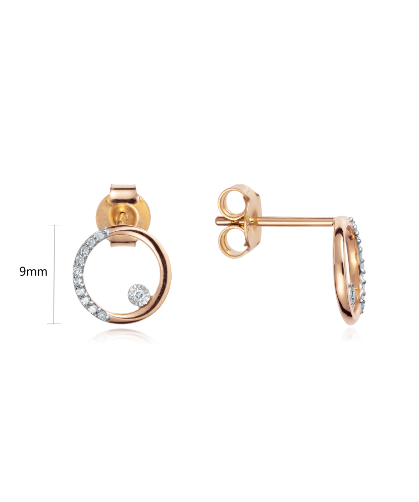 Kultaiset korvakorut timanteilla