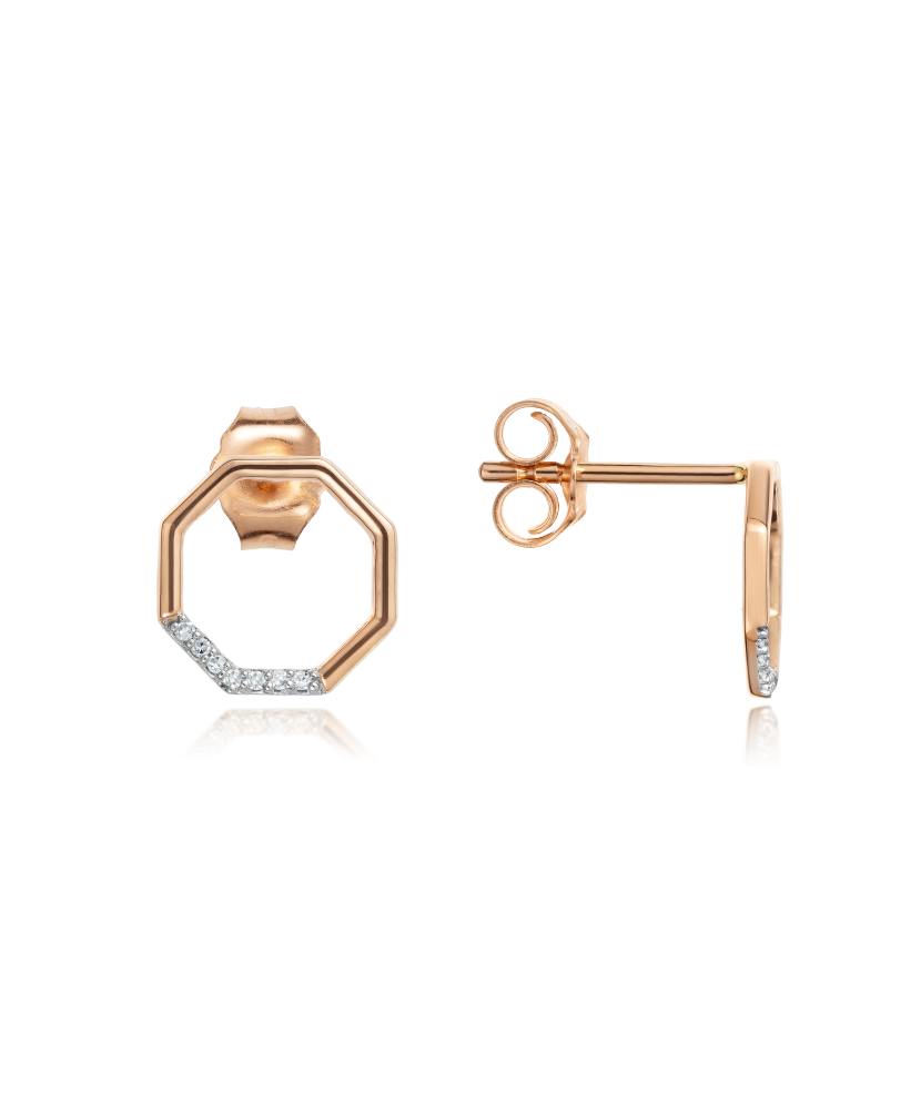 Kultaiset korvakorut timanteilla