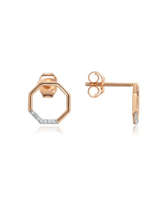 Kultaiset korvakorut timanteilla