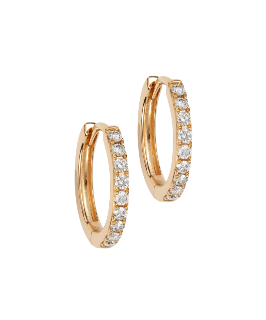 Kultaiset korvakorut timanteilla