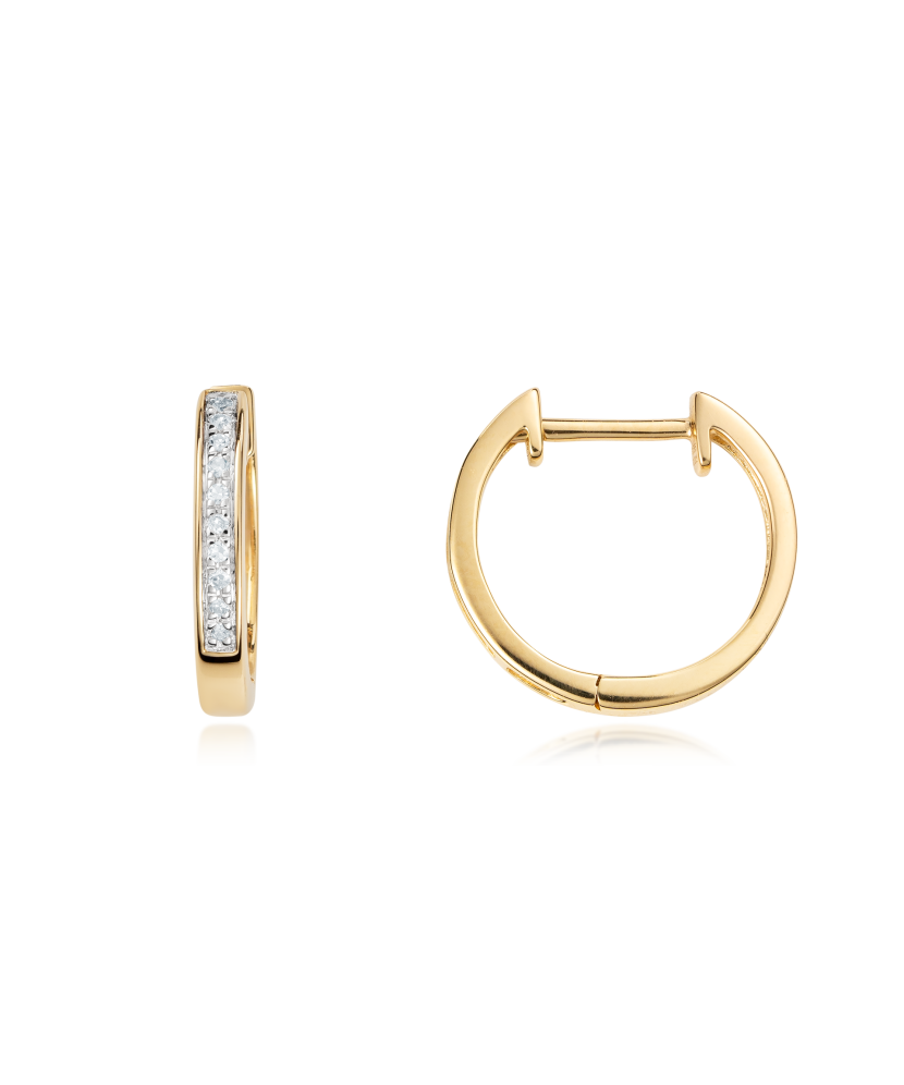 Keltaiset kultaiset korvakorut timanteilla