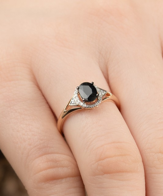 Gold ring with sapphire and diamonds