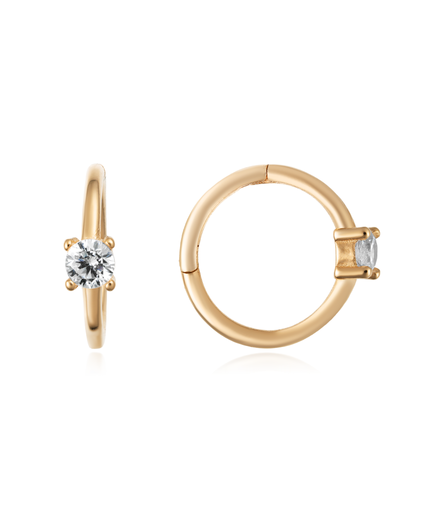 Kultaiset korvakorut zirkoneilla