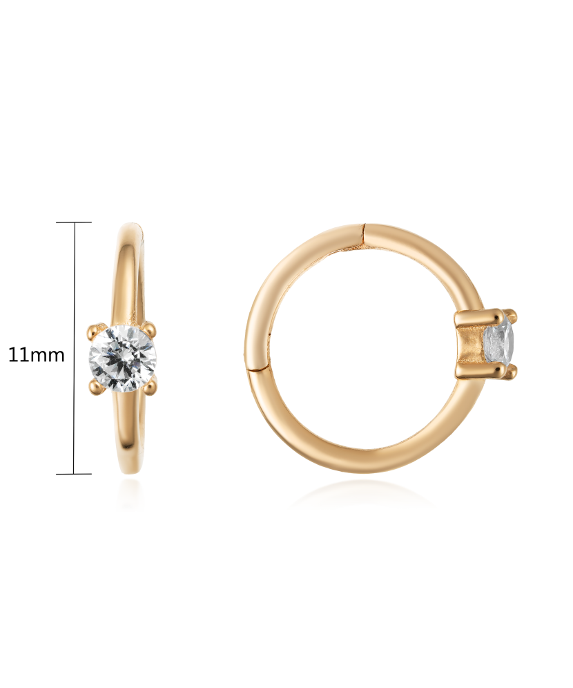 Kultaiset korvakorut zirkoneilla