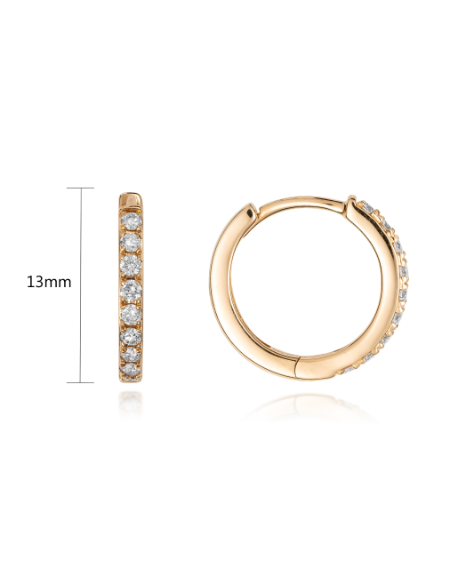 Kultaiset korvakorut timanteilla