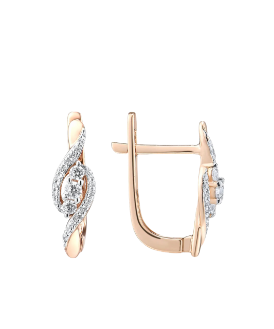 Kultaiset korvakorut timanteilla