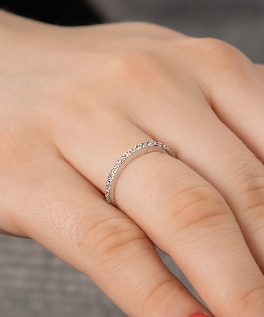 White gold ring with zircons