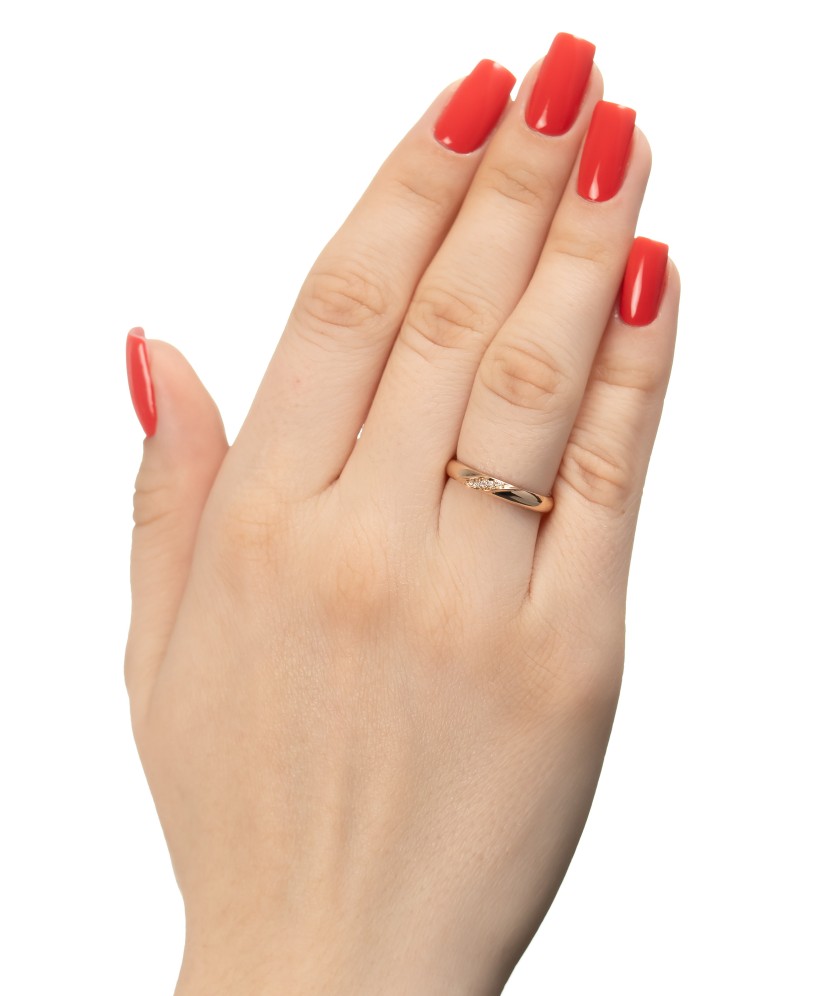 Gold ring with zircons