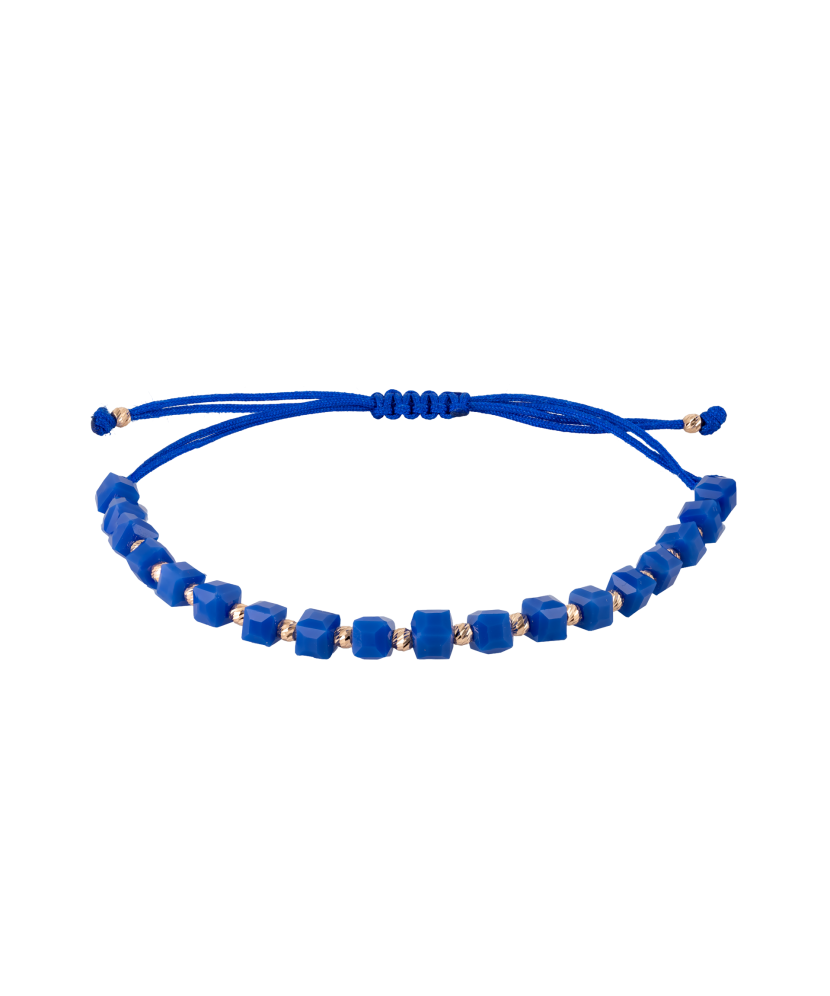 Sininen tarjoaa rannekorun kullan kanssaja onyxilla