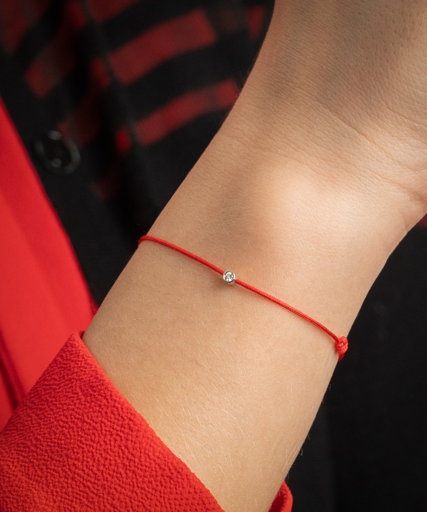 Red string bracelet with white gold and diamond pendant 0.03ct