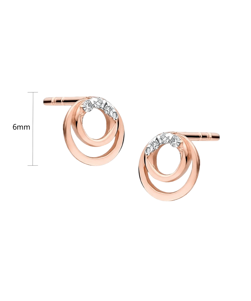 Kultaiset korvakorut timanteilla