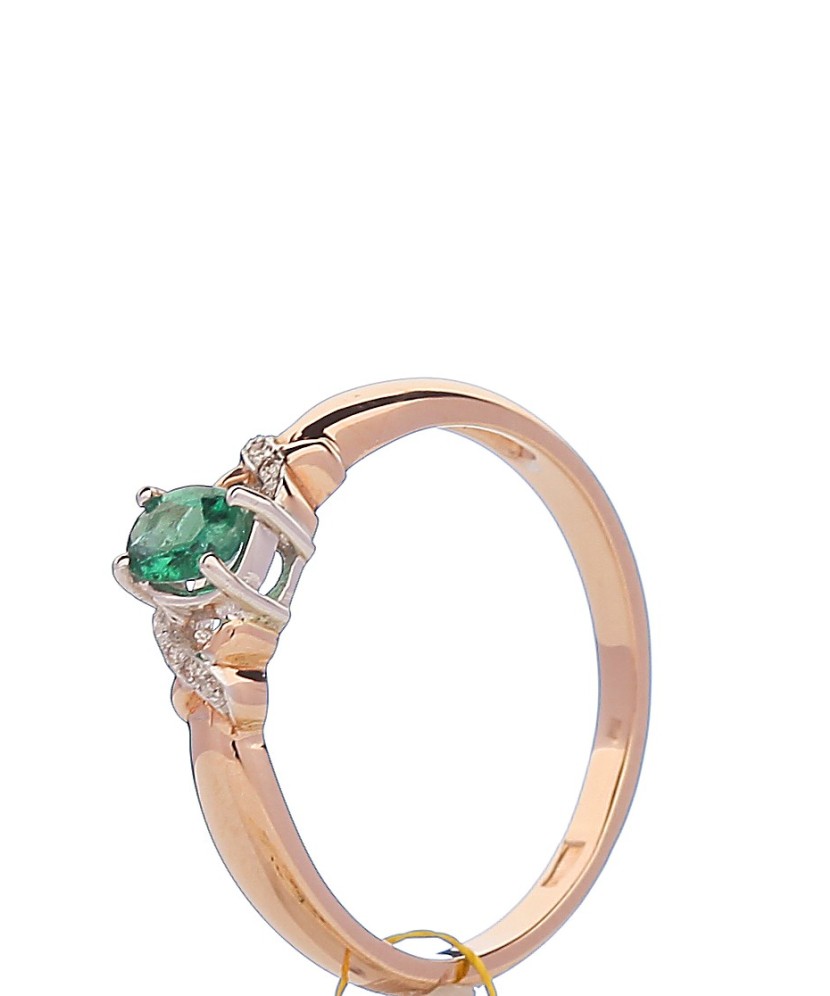 Gold ring with emerald and diamonds