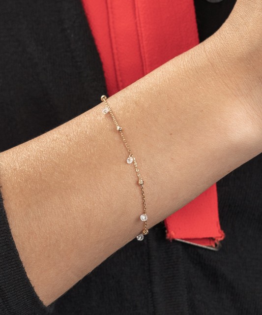 Gold bracelet with zircons