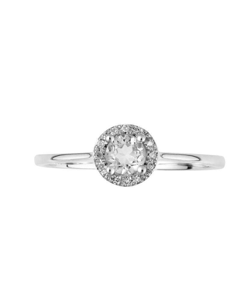 White gold ring with diamonds and clear topaz