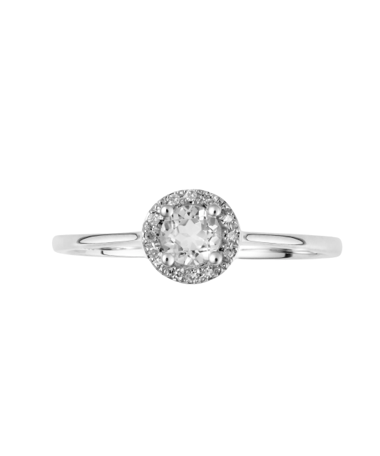 White gold ring with diamonds and clear topaz