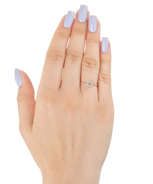 White gold ring with diamonds and clear topaz