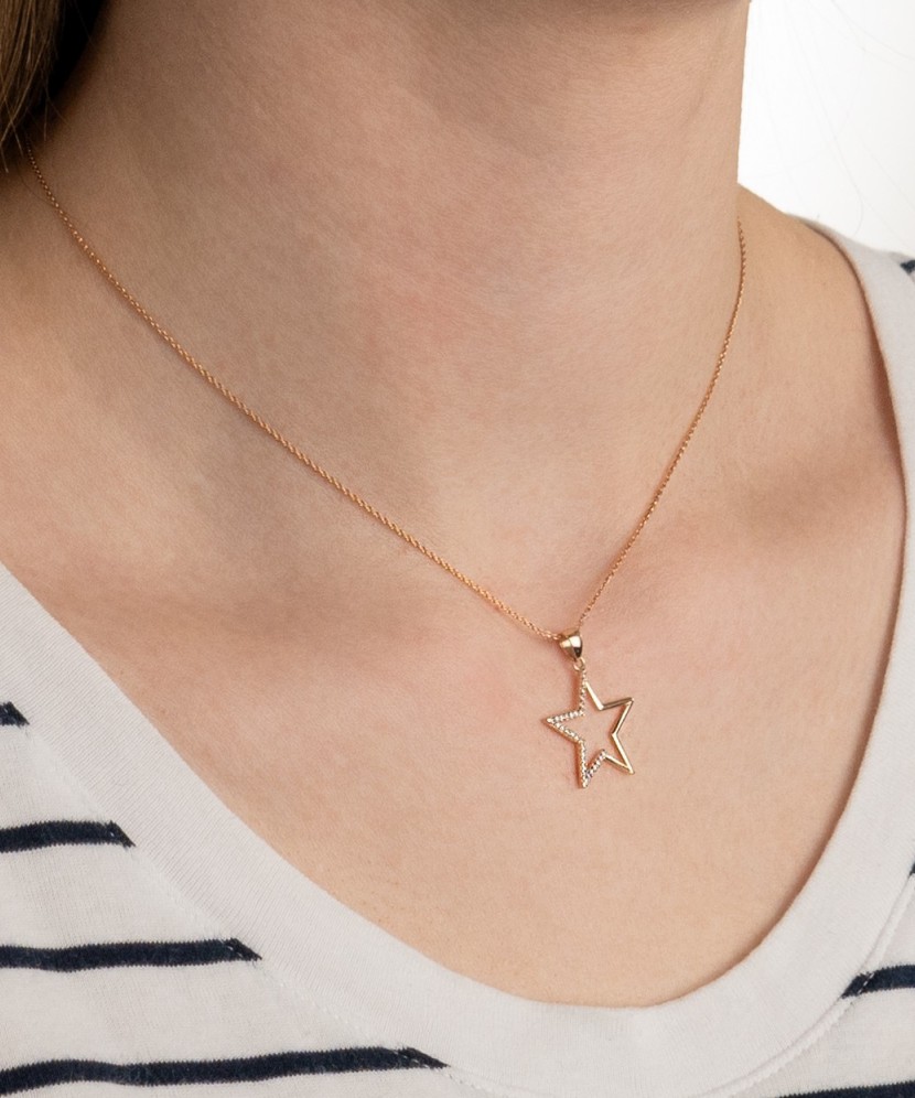 Gold pendant with zircons "star"